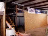 Wood and Fiberglass fabrication shop, and stairs to second floor inventory area