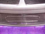 Closeup of Ntercooler spray bar behind Wings West front bumper and Plasma Glow undercarriage lighting