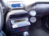 GReddy gauges installed to the right of stereo and Apex-i controller