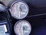 Closeup view of GReddy gauges