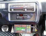 Custom panel holds GReddy Profec A boost controller and GReddy turbo timer, Wolf computer controller below