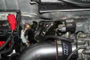 Relocated the fuel filter and supply lines to properly install the H22 with the intake system