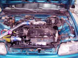 Engine bay after installation of GReddy turbo kit