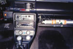NOS Sneaky Pete bottle mounted in glovebox