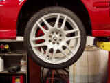 Motegi Racing wheel mounted over Powerslot Plus big brake kit
