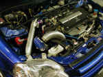Engine view after GReddy turbo kit installation on 2000 Honda Civic Si
