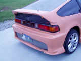 Right rear quarter view of molded and primed bodykit....notice how nice the bumper flares turned out