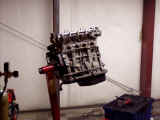 Engine on stand being assembled