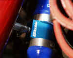Closeup of GReddy radiator hose adapter installed in Samco lower radiator hose