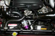 GReddy Type S BOV installed with custom brackets and hose