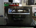 Custom carbon fiber panel with Alpine CD, HKS EVC, and HKS turbo timer