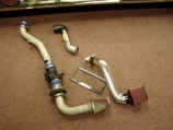 Comparison of old eBay intake on left with our AEM cold air intake on right