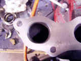 GReddy turbo manifold at the beginning of gasket matching (stencil marks can be seen)