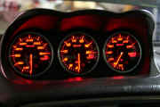 Defi 60mm red-amber BF Imperial gauges mounted in Defi meter hood