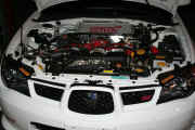 Engine view after installation of APS top mount dual vent BOV
