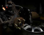 Test fitting Wilwood 4 piston caliper to new brackets to test for clearances