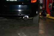 Rear view of GReddy SP2 exhaust system installed on Toyota Celica GT