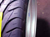 Inside lip view of 265/35ZR18 Toyo T1S tire mounted but not inflated onto Volk Racing GT7 18"x10" wheel