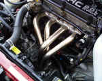 GReddy stainless steel 4-1 header on Dodge Avenger