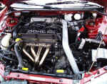 GReddy stainless steel header and AEM cold air intake